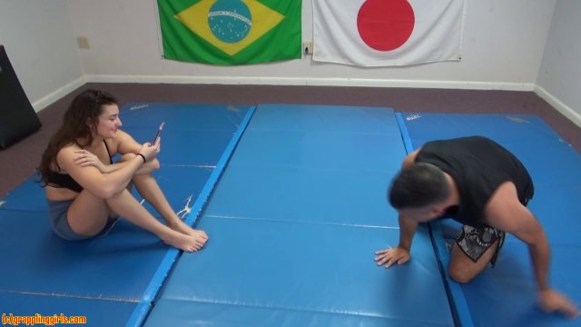 Poster: Grappling Girls in Action Scissorhold - GGDistractedWrestling