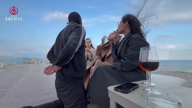 Poster: MissErinia: foot kissing femdom - The three Mistresses humiliate the slave on the rooftop